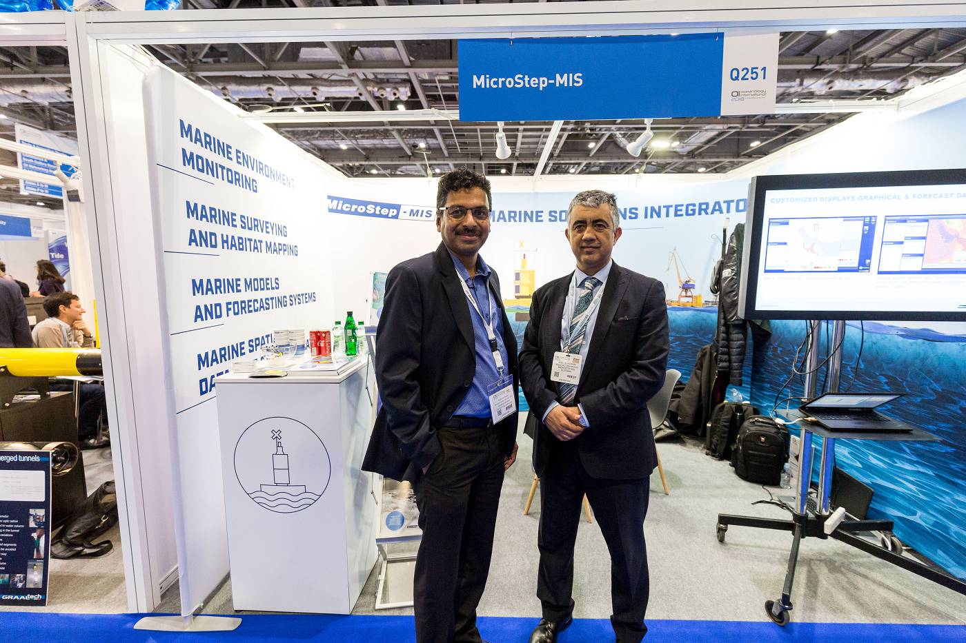 MicroStep-MIS representatives in front of the company stand